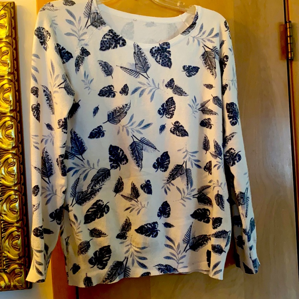 Soft beautiful white sweater with blue leaves
